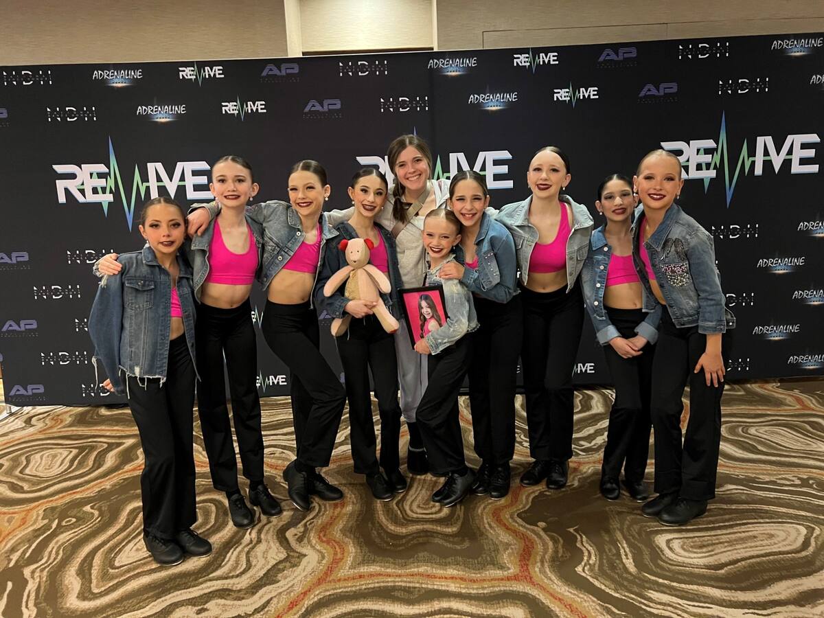 Tabor with her tap cast at Revive Dance Convention